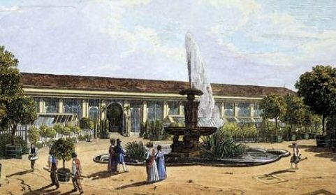 ウィーン・オランジェリーの庭園の絵には、背景のオランジェリー、その前を散歩をする人々やオランジェリーに植物を運搬している労働者が描かれています。